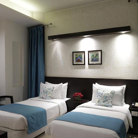 Rockland Hotel, C.R Park New Delhi Exterior photo