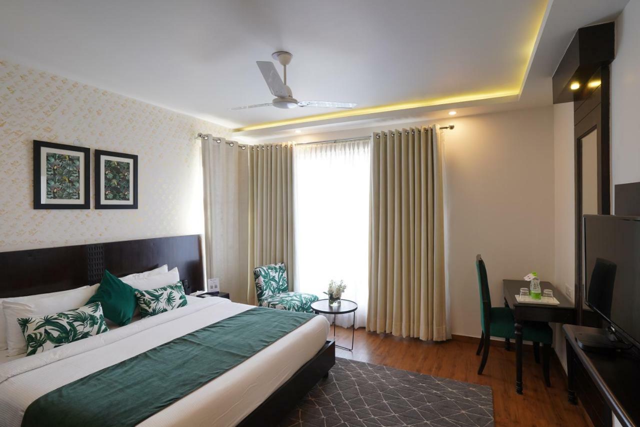 Rockland Hotel, C.R Park New Delhi Exterior photo